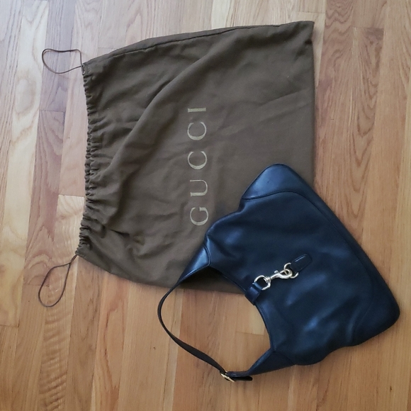 Gucci Handbags - Gucci black leather purse